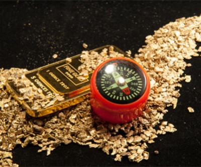 Gold with compass