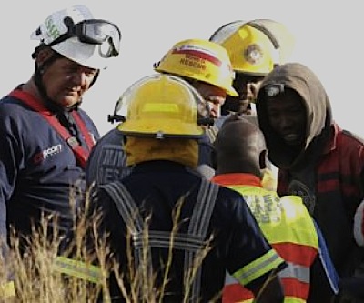 Twelve of dozens illegal miners trapped in a South African mine rescued and arrested