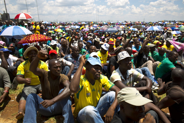 South African platinum miners review wage demands, will march in Pretoria as strike, talks, go on