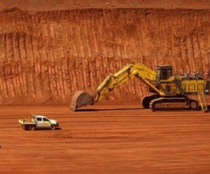 Rio Tinto digging up more iron ore despite slumping prices