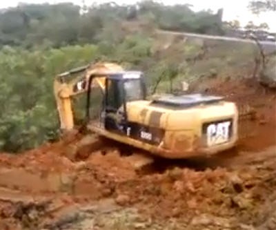 excavator swept downhill