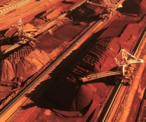 BHP Billiton beats iron ore guidance, takes copper write-downs