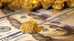 Gold prices hit 4-week-low retreat as dollar strengthens