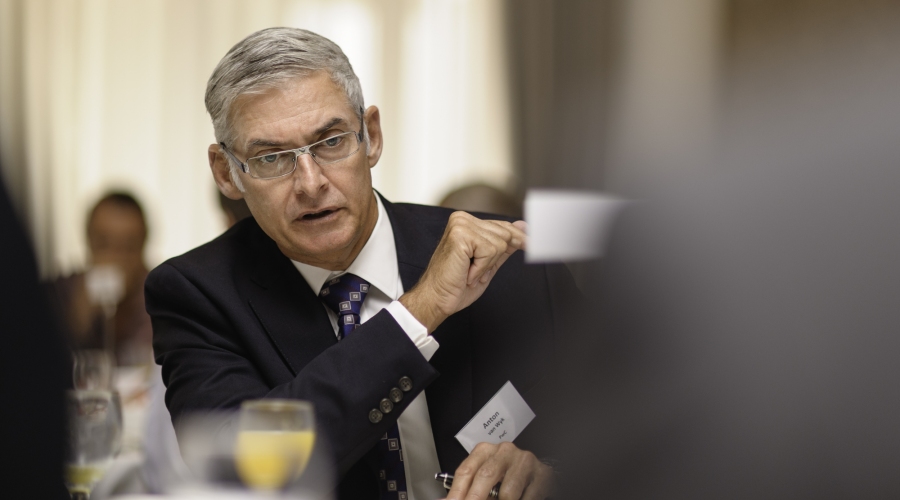 Anton van Wyk, partner at PwC, guiding round table discussion on issues facing South African mining sector at the 2016 Joburg Indaba breakfast