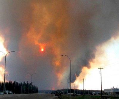 A wildfire forced a state of emergency and evacuation in Fort McMurray. The fires also shut down several oil sands operations close by.