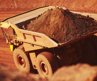 BHP hits record iron ore output but warns of risks from virus