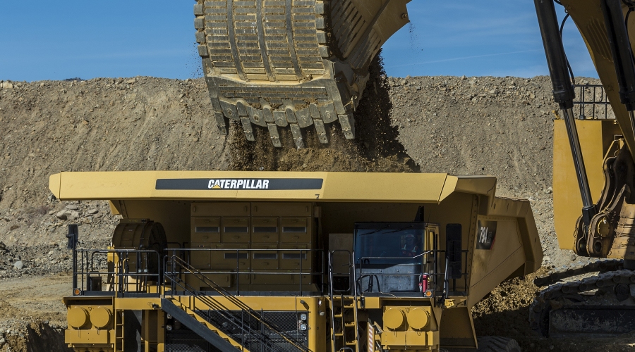 cat-794-ac-truck-being-loaded-by-cat-6060-hydraulic-shovel