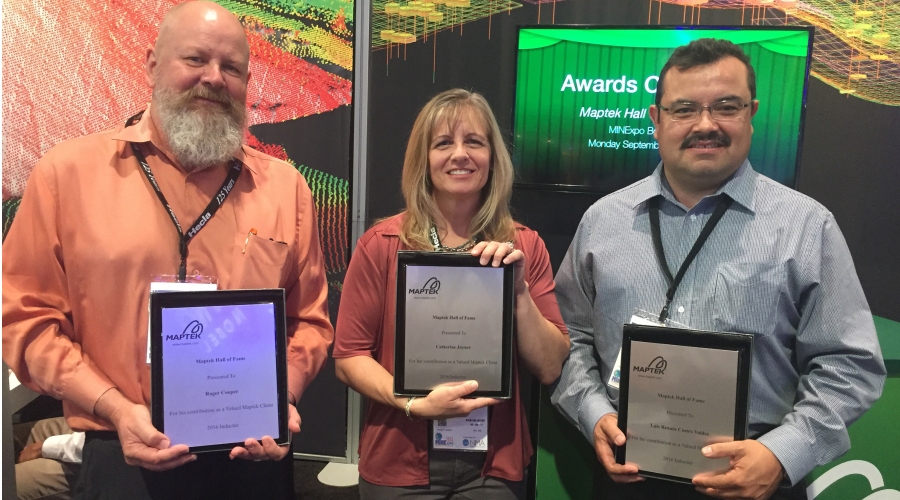 Roger Cooper, Cat Joyner and Luis Castro with their Hall of Fame awards at MINExpo.
