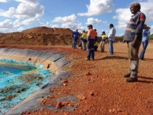 Donald Shadforth, a traditional owner, at the dilapidated Redbank mine tailings storage. Photo: P. Taplin.