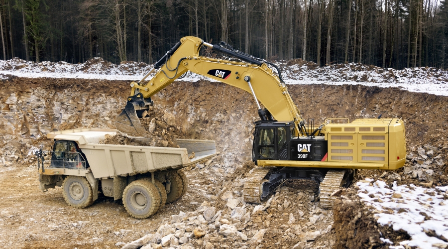 Cat 390F Hydraulic Excavator loading quarry truck