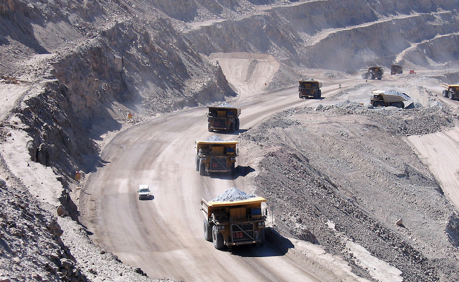 Mining trucks at Codelco's Chuquicamata copper mine in Chile. Haul truck fleets are more flexible than IPCC systems, but are expensive to operate. 