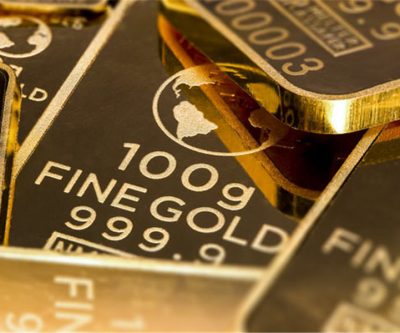 Invesco cuts fees for gold ETF as low-costers gain market share