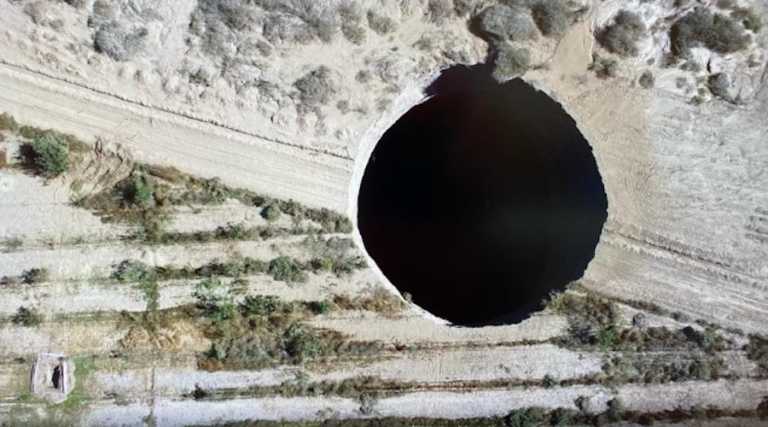 The huge 36-meter-diameter sinkhole that opened up in late July in the Tierra Amarilla commune