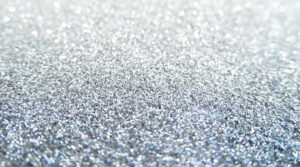 Silver-coloured particles.