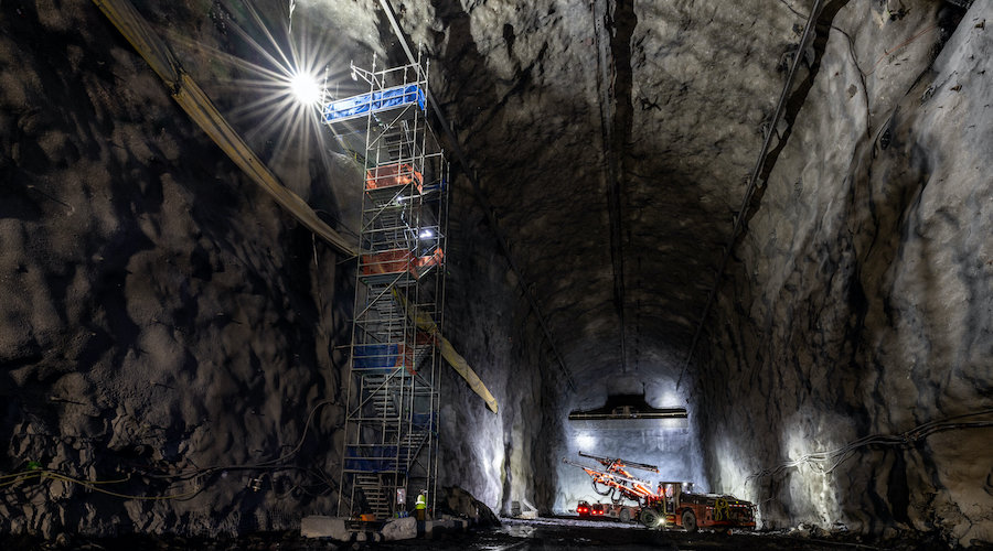 Construction workers created colossal caverns, each more than 500 feet long and about seven stories tall, for the gigantic particle detector modules of the Deep Underground Neutrino Experiment, hosted by Fermilab