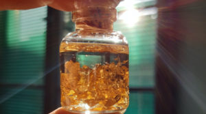 Gold particles in a bottle